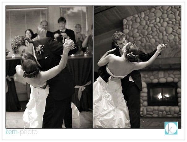 A bride and groom performing a dip.